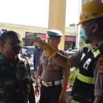 Cegah Penyebaran Covid-19, Satlantas Gelar Penyemprotan dan Cek Suhu Tubuh